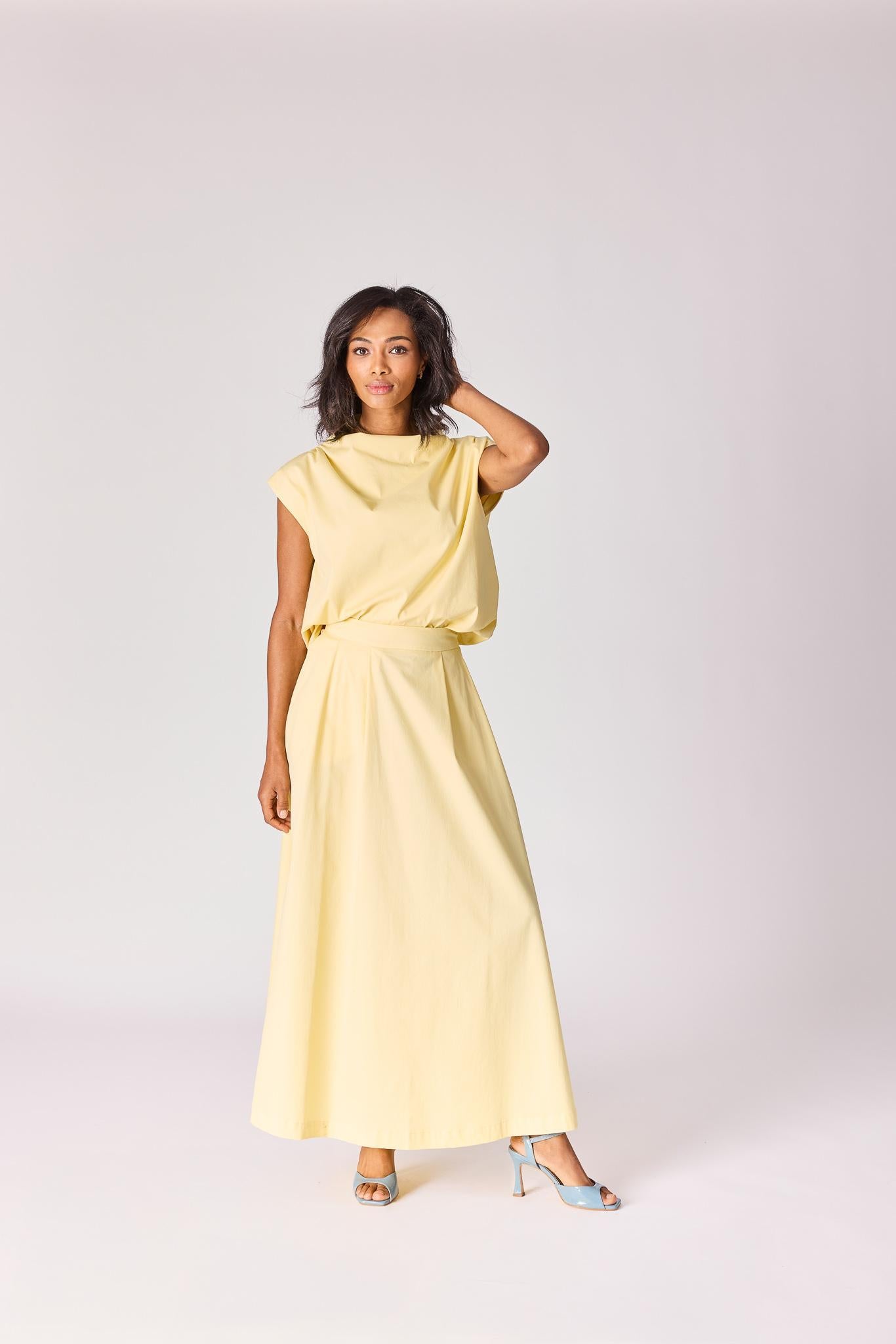 Lange rok met plooien - Butter yellow