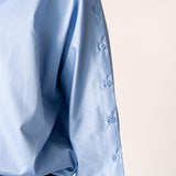 Oversized blouse met knoopdetail - Light blue