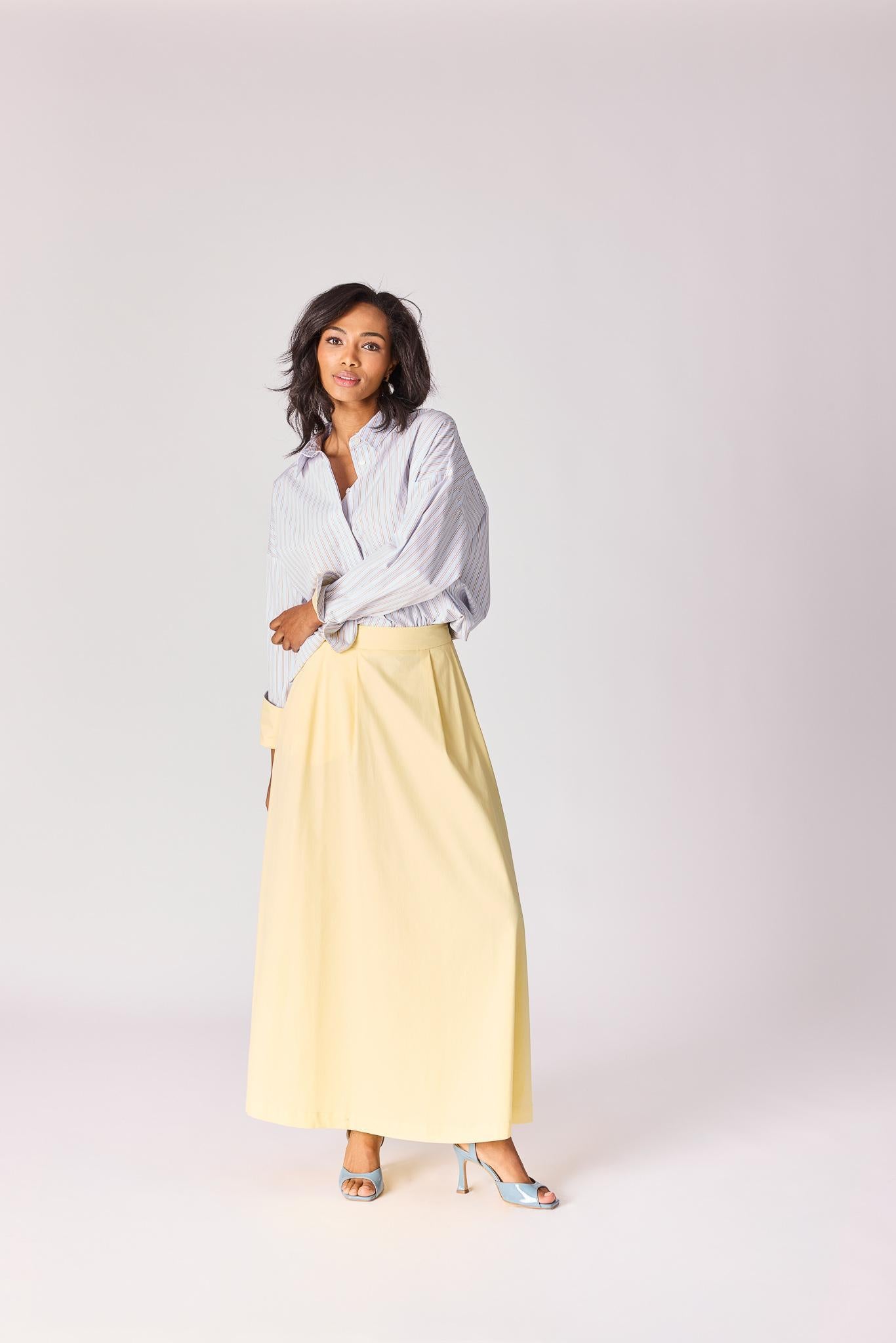 Lange rok met plooien - Butter yellow