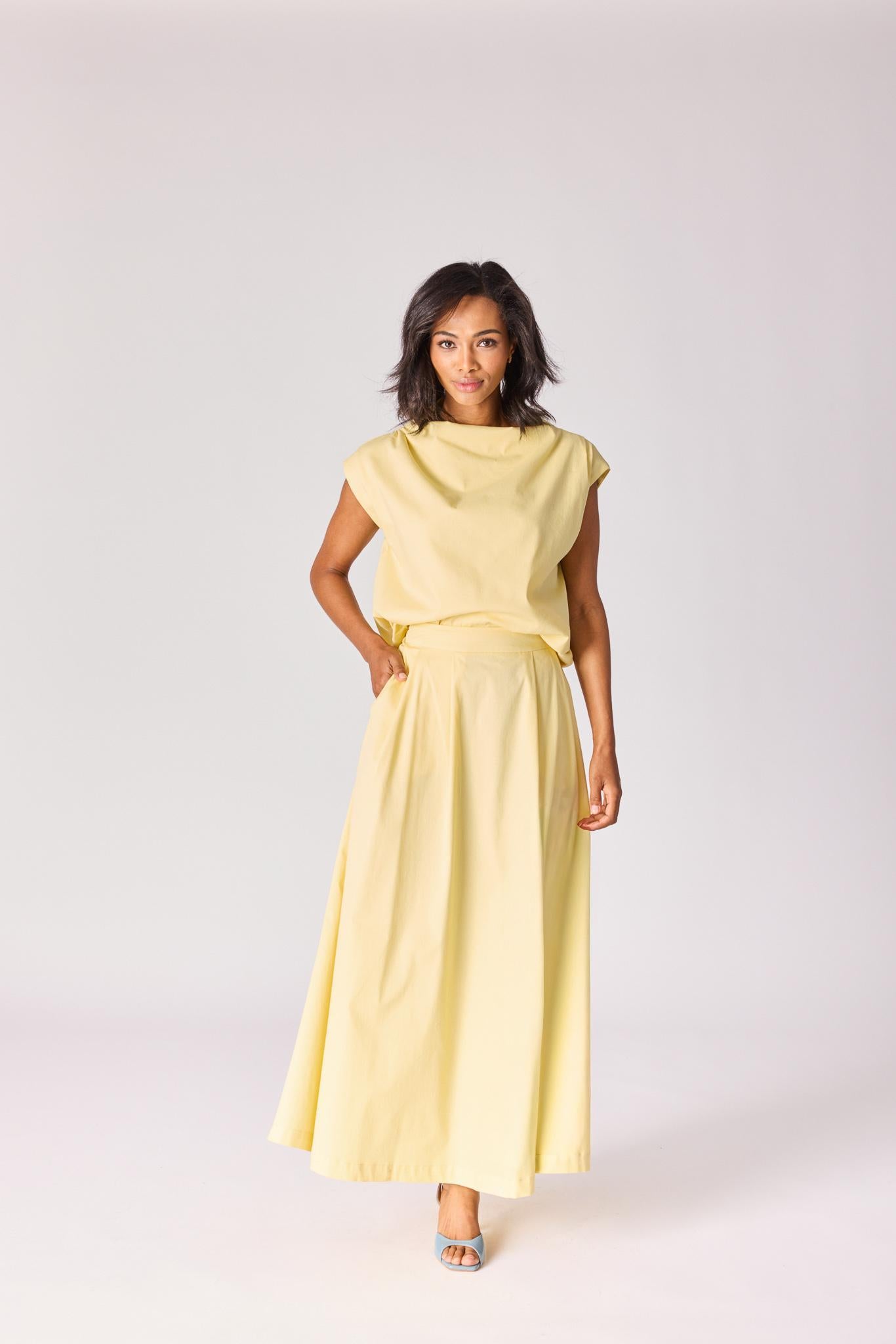 Lange rok met plooien - Butter yellow