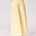 Lange rok met plooien - Butter yellow