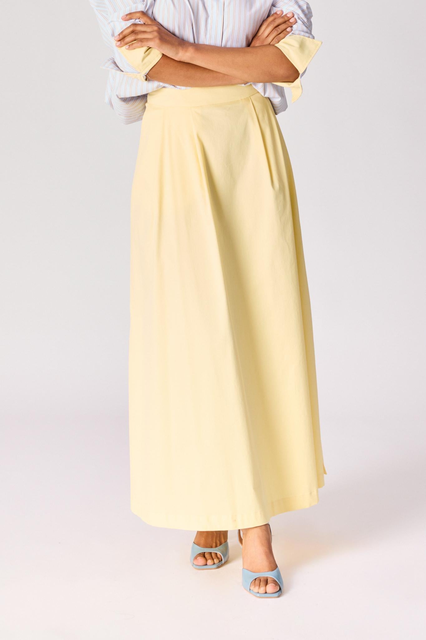 Lange rok met plooien - Butter yellow